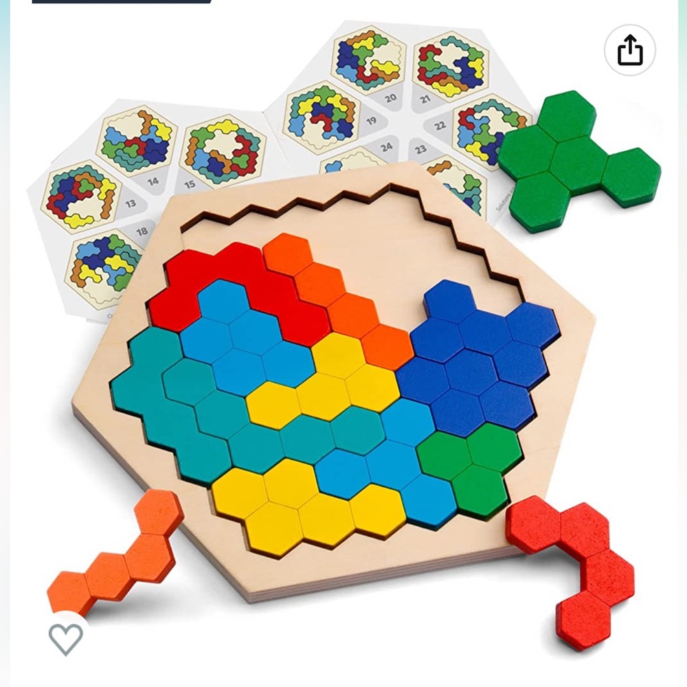 Hexagon wooden puzzle. Comes with challenges and solutions.